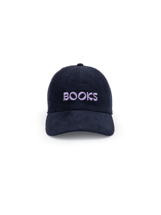 A navy blue corduroy baseball cap with the word 'BOOKS' embroidered on the front.