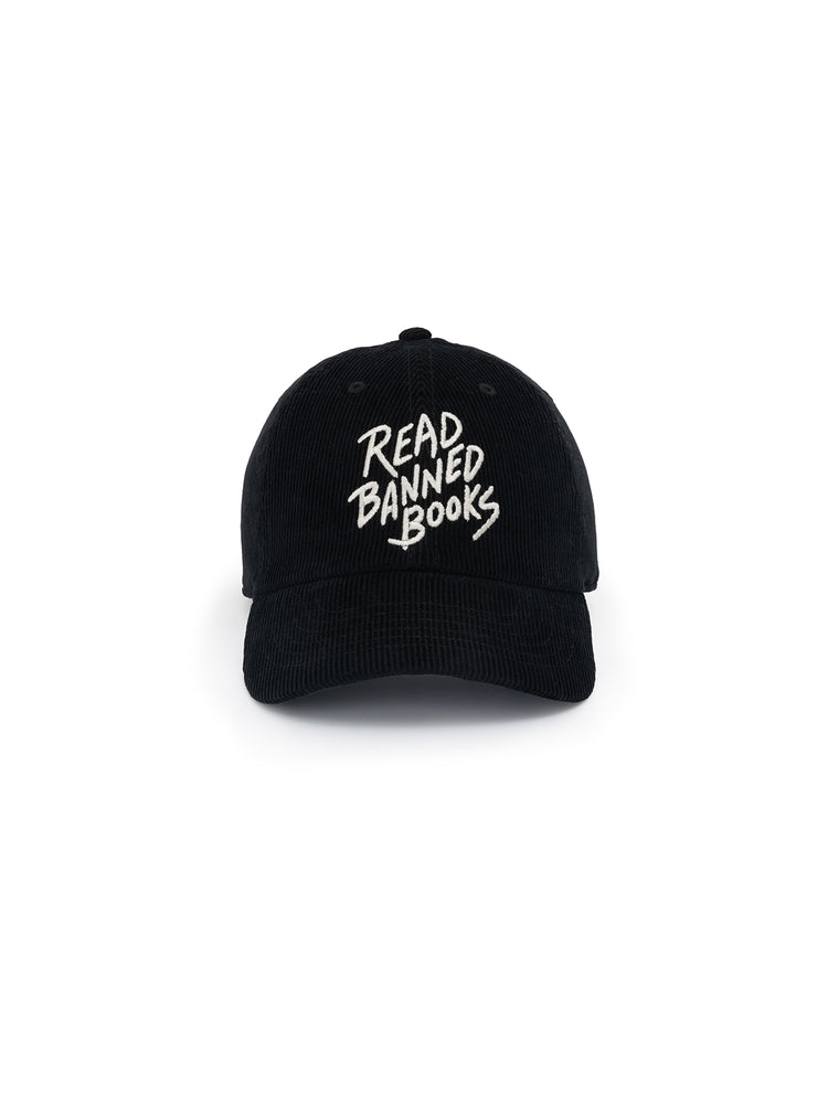 A black corduroy baseball cap with 'READ BANNED BOOKS' embroidered on the front.