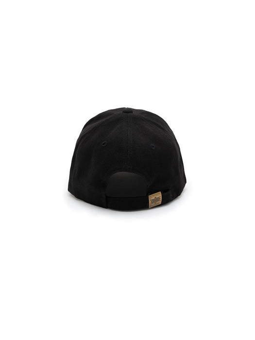 Black cap with a brand tag on a white background