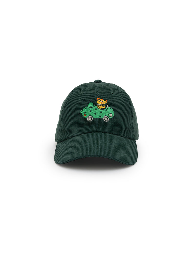 A dark green corduroy baseball cap with an embroidered design of Richard Scarry's Pickle Car on the front.