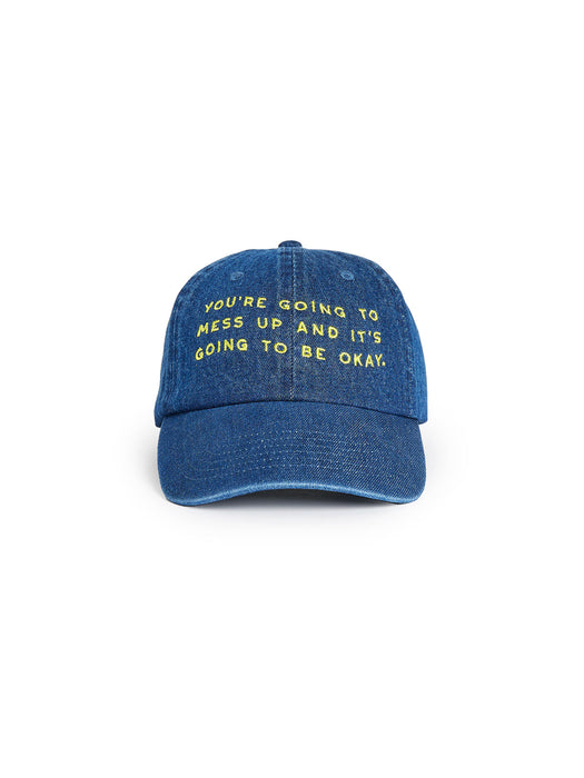 Blue cap with yellow text on a white background