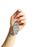 Hand holding a keychain with a decorative tag against a white background