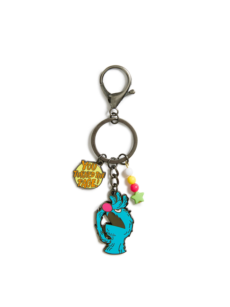 Keychain featuring Grover and colorful charms on a white background