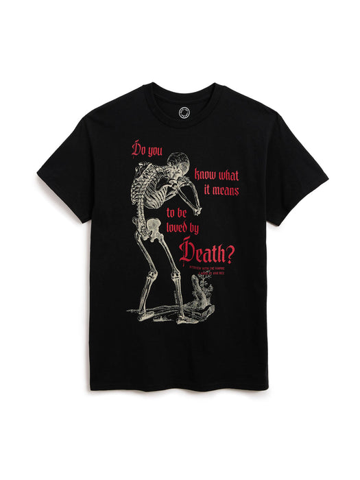 A black short-sleeve graphic t-shirt featuring a skeleton illustration and the text 'Do you know what it means to be loved by Death?' in red and white, displayed against a plain white background.