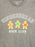 Close-up of a heather gray crewneck t-shirt featuring a graphic print of three gingerbread cookies reading books with the words 'GINGERBREAD BOOK CLUB' in white.
