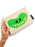A hand holding a beige canvas pouch with a green pickle graphic and the text 'I [heart] PICKLES'. The pouch has a pink zipper and a black 'OUT OF PRINT brand tag on the side.