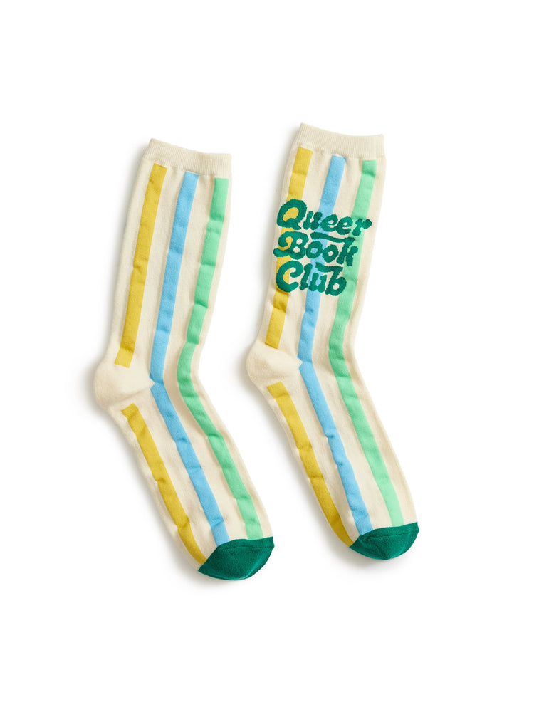 Striped socks with 'Queer Book Club' text on a white background