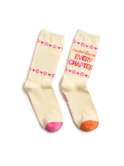 Pair of socks with text and heart patterns on a white background