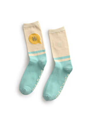 Pair of socks with a 'Hi' design on a white background
