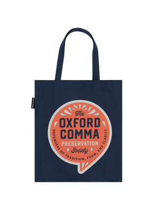 A navy blue cotton tote bag with the 'Oxford Comma Preservation Society' logo printed in orange and white on the front.