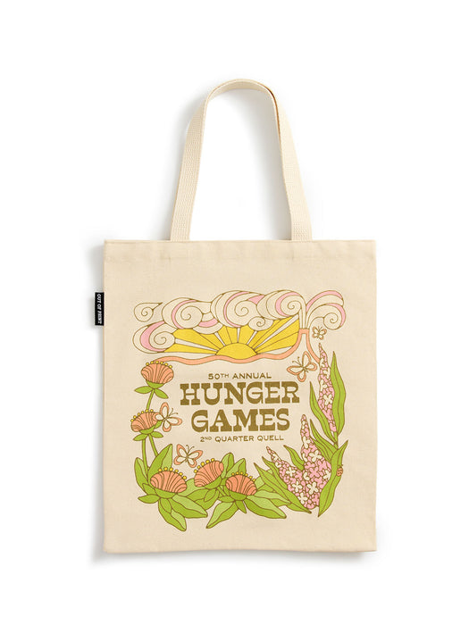 A cream-colored canvas tote bag with long handles, featuring a colorful retro-style graphic for the '50th Annual Hunger Games 2nd Quarter Quell' with a sun, flowers, and leaves, shown on a plain white background.