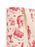 A close-up of a canvas tote bag featuring a red vintage-style graphic print on a cream background, with red shoulder straps visible on the right side.