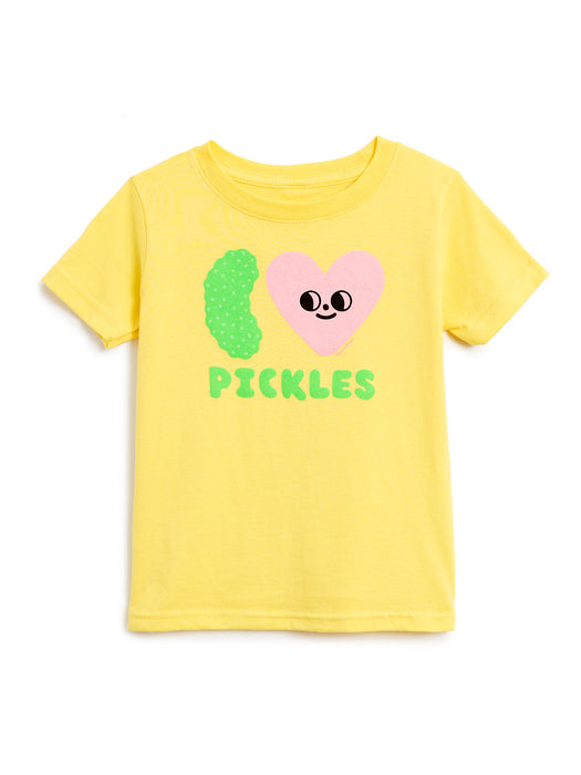 A yellow short-sleeve kids' t-shirt featuring a graphic of a green pickle and a pink heart with a face, above the word 'PICKLES' in green, shown on a plain white background.