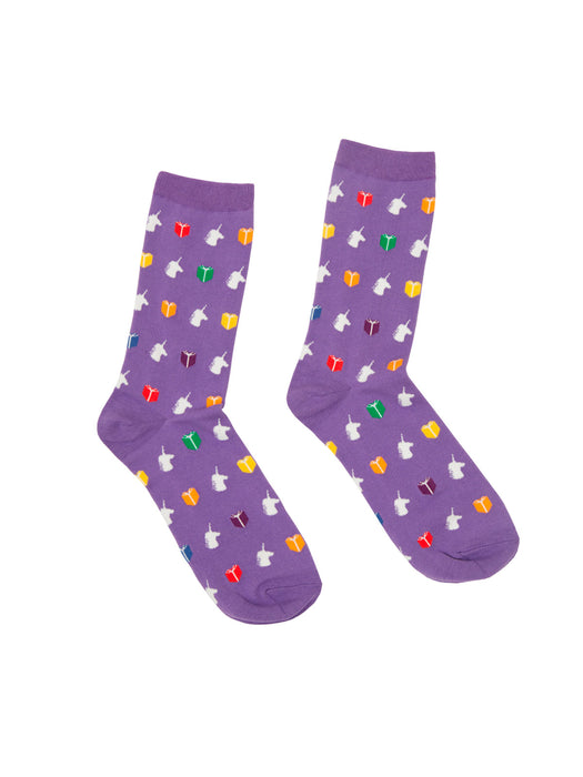 A pair of purple socks with a pattern of colorful icons, such as books and unicorns, on a white background.
