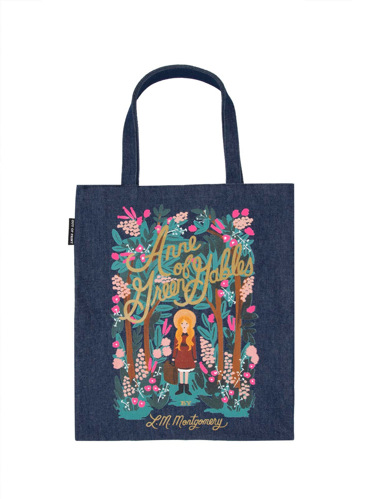 A dark blue denim tote bag featuring a floral and character illustration from the Anne of Green Gables series