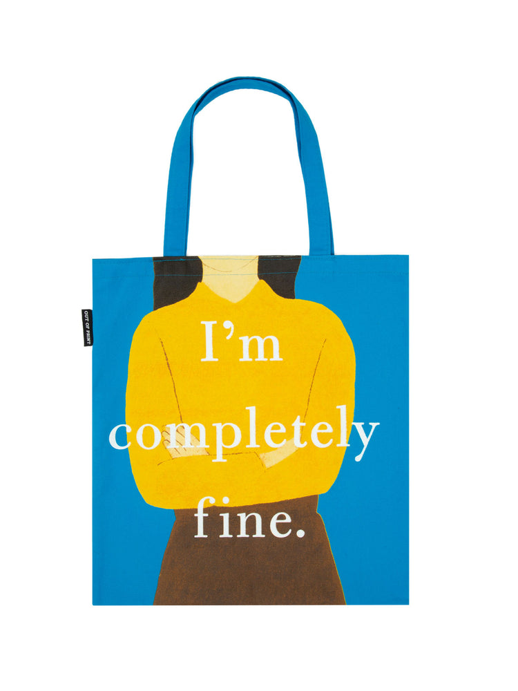 Canvas tote bag with blue straps and a graphic print of a character in yellow top with the text 'I'm completely fine.'